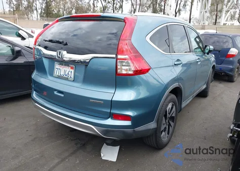 2015 Honda Cr-V Touring z USA, uszkodzony, nr VIN 5J6RM3H94FL023993